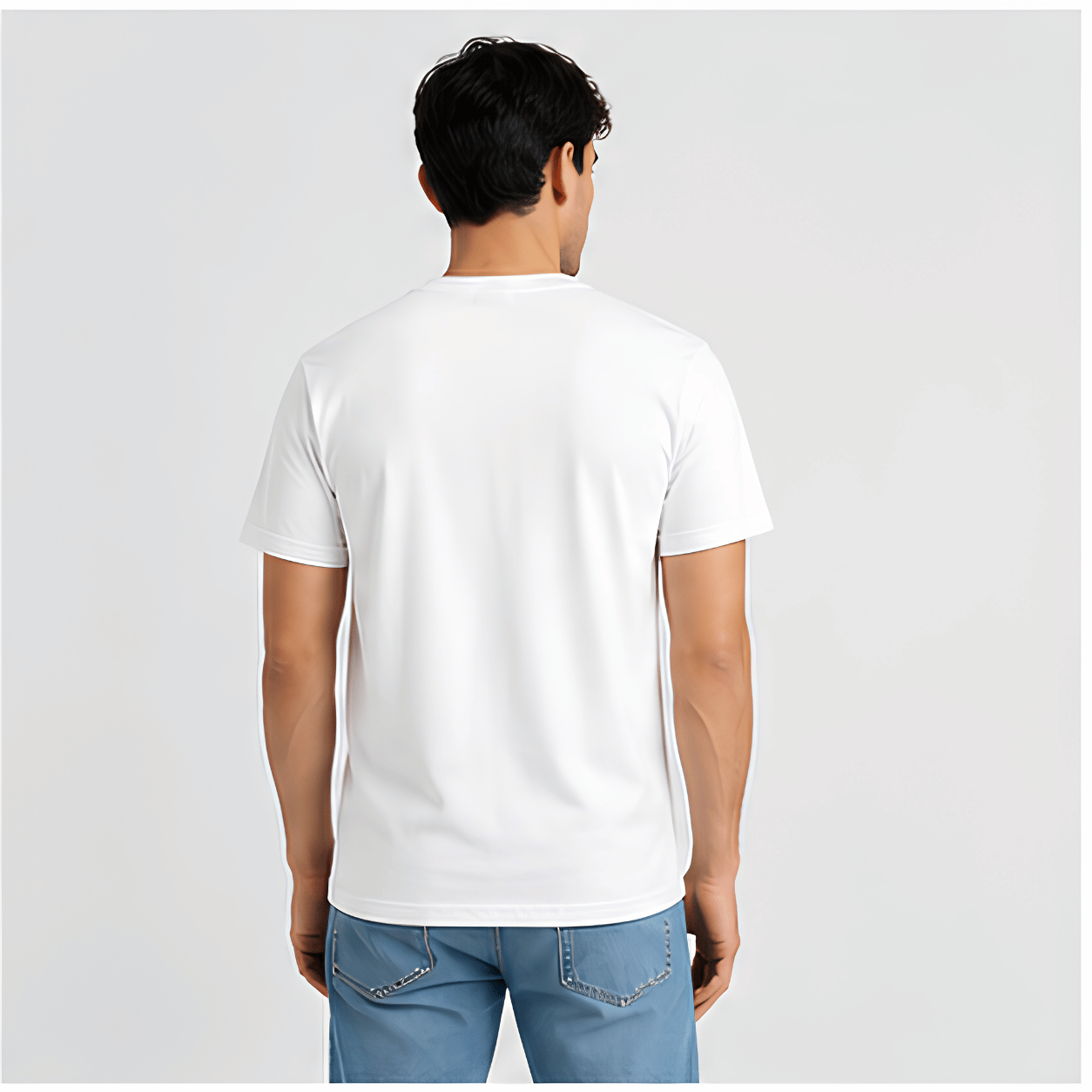 Person wearing a plain white t-shirt on a light gray background