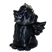 3D-Printed Dragon Keychain Storage Container - SearchPify - Black dragon-shaped keychain on a white background