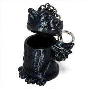 3D-Printed Dragon Keychain Storage Container - SearchPify - Black dragon-shaped keychain with a small open container on a white background