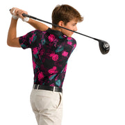 Electric Flamingo Youth/Teen Golf Polo - SearchPify - Child wearing a colorful golf shirt and holding a golf club on a white background
