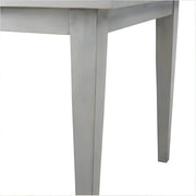 The Windermere Square Dining Table - SearchPify - Close-up of a gray metal table leg on a white background